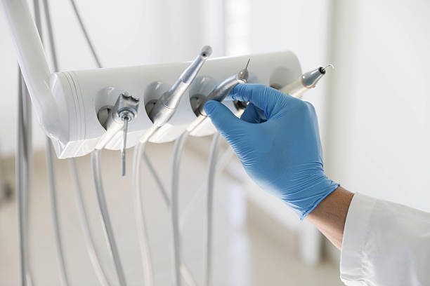 Professional Tooth Extraction technician working in Hollis, OK